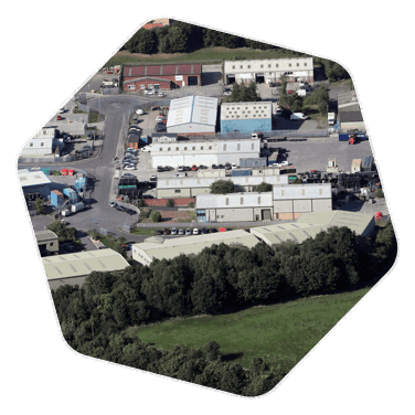 A drone shot of Boyton Hall, an industrial site with large warehouse style buildings with cars parked around these buildings